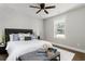 Comfortable bedroom featuring a ceiling fan and natural light from a window at 2716 Battle Sw Trl, Marietta, GA 30064