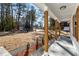 Covered porch with wood columns and view of neighborhood at 2716 Battle Sw Trl, Marietta, GA 30064