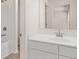 Clean bathroom with vanity, mirror, and bathtub at 13561 Whitman Lane, Covington, GA 30014