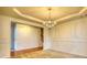 Formal dining room showcasing hardwood floors and neutral walls at 5044 Estonian Dr, Fairburn, GA 30213