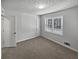 Simple bedroom with neutral colored walls at 3123 Shiloh Pl, Canton, GA 30115