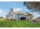 House with backyard, green grass, and gazebo at 4497 Black Water Cv, Ellenwood, GA 30294