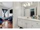 Bright bathroom with vanity and access to bedroom at 4497 Black Water Cv, Ellenwood, GA 30294