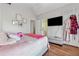 Bedroom with queen-size bed and en-suite bathroom at 4497 Black Water Cv, Ellenwood, GA 30294