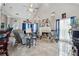 Living room with fireplace, high ceilings and ample natural light at 4497 Black Water Cv, Ellenwood, GA 30294