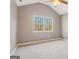 Bedroom with vaulted ceiling, neutral walls, and carpeting at 262 French Village Blvd, Sharpsburg, GA 30277