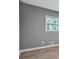 Gray walls and wood-look flooring in this bedroom at 1679 Hollyhock Ter, Decatur, GA 30032