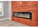 Modern linear fireplace with wood wall at 1679 Hollyhock Ter, Decatur, GA 30032