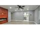 Modern living room with fireplace and wood accent wall at 1679 Hollyhock Ter, Decatur, GA 30032