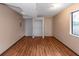 Unfinished basement room with closet and wood floor at 2491 Crumps Landing Cir, Snellville, GA 30039