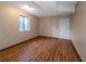 Bright basement room with wood flooring and an exterior door at 2491 Crumps Landing Circle, Snellville, GA 30039