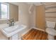 Simple bathroom with pedestal sink and toilet at 2491 Crumps Landing Cir, Snellville, GA 30039