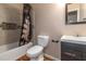 Clean bathroom with tub shower, toilet and vanity at 2491 Crumps Landing Cir, Snellville, GA 30039