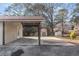 Carport with attached storage shed in backyard at 2491 Crumps Landing Circle, Snellville, GA 30039