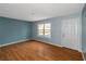 Living room featuring wood floors and a view at 2491 Crumps Landing Cir, Snellville, GA 30039