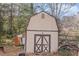 Large barn-style storage shed in the backyard at 2491 Crumps Landing Circle, Snellville, GA 30039