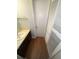 Clean bathroom with a sink, toilet and linen closet at 894 Glynn Oaks Dr, Clarkston, GA 30021