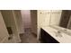 Bathroom with double vanity and a view of bedroom at 3551 Brycewood Dr, Decatur, GA 30034