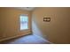 Bright bedroom with carpeted floor and a window at 3551 Brycewood Dr, Decatur, GA 30034