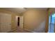 Spacious bedroom with neutral walls, ceiling fan, and window at 3551 Brycewood Dr, Decatur, GA 30034