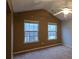 Large bedroom with vaulted ceiling, neutral walls and carpet flooring at 3551 Brycewood Dr, Decatur, GA 30034