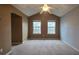 Primary bedroom with vaulted ceilings and two windows at 3551 Brycewood Dr, Decatur, GA 30034