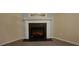Electric fireplace with a modern mantel and tile surround at 3551 Brycewood Dr, Decatur, GA 30034