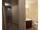 Upper hallway with carpet and access to bedrooms and bathrooms at 3551 Brycewood Dr, Decatur, GA 30034