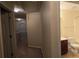 Upper hallway with carpet and access to bedrooms and bathrooms at 3551 Brycewood Dr, Decatur, GA 30034