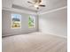 Bright bedroom with neutral walls and plush carpeting at 5629 Hislop Ln # 85, Mableton, GA 30126