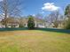 Large backyard is flat and fully fenced, ready for outdoor entertaining at 1379 Paddocks Way, Powder Springs, GA 30127