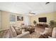 Living room with furniture and a large TV at 1379 Paddocks Way, Powder Springs, GA 30127