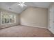 Spacious bedroom with vaulted ceiling and carpeting at 1538 Park Grove Dr, Lawrenceville, GA 30046