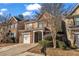 Two-story home with attached garage and front yard landscaping at 1538 Park Grove Dr, Lawrenceville, GA 30046