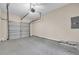 Spacious two car garage with painted concrete floors and metal garage door at 1538 Park Grove Dr, Lawrenceville, GA 30046