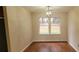 Bright dining room with hardwood floors and chandelier at 2082 Montgomery Trl, Duluth, GA 30096