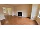 Living room featuring hardwood floors and fireplace at 2082 Montgomery Trl, Duluth, GA 30096