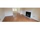 Spacious living room with hardwood floors and fireplace at 2082 Montgomery Trl, Duluth, GA 30096