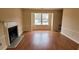 Bright living room with hardwood floors and fireplace at 2082 Montgomery Trl, Duluth, GA 30096