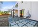 Modern patio with flagstone flooring and hanging chair, extending from a contemporary home at 2220 Meadowvale Ne Dr, Atlanta, GA 30345