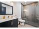 Contemporary bathroom with walk-in shower and floating vanity at 2220 Meadowvale Ne Dr, Atlanta, GA 30345