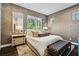 Spacious bedroom with plush bedding and ample natural light at 2220 Meadowvale Ne Dr, Atlanta, GA 30345