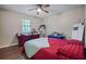 Bedroom with wood flooring and a queen bed at 102 Chip Pl, Stockbridge, GA 30281