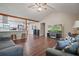 Open concept living area with a fireplace and kitchen view at 102 Chip Pl, Stockbridge, GA 30281