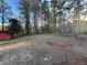 Large backyard with mature trees and open space at 1840 Judy Se Cir, Marietta, GA 30060