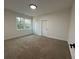 Spacious bedroom with carpeted floors and neutral walls at 1840 Judy Se Cir, Marietta, GA 30060