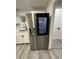 Stainless steel refrigerator with ice and water dispenser in modern kitchen at 1840 Judy Se Cir, Marietta, GA 30060