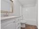 Clean bathroom with updated vanity and tiled flooring at 4974 Dovecote Trl, Suwanee, GA 30024