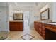 Double vanity bathroom with granite countertops and large shower at 4974 Dovecote Trl, Suwanee, GA 30024