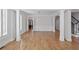 Formal dining room with hardwood floors and white wainscoting at 4974 Dovecote Trl, Suwanee, GA 30024